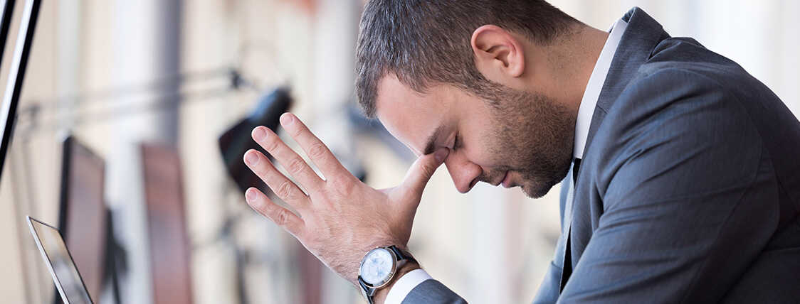 Disappointed man who just found out he failed the CFP exam