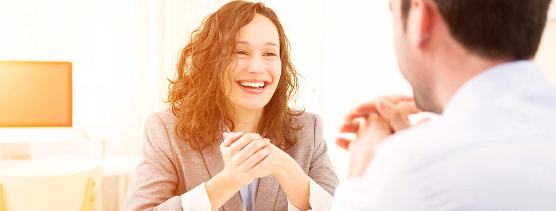 Woman being interviewed for a finance position